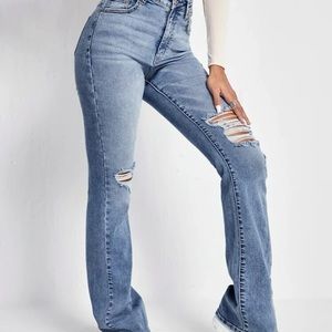 Slant Pocket Ripped Flair Leg Jeans